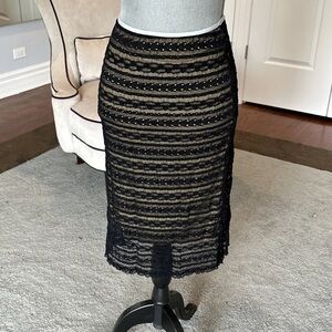 Anthropologie Black lace pencil skirt with nude lining. Lined. Size small